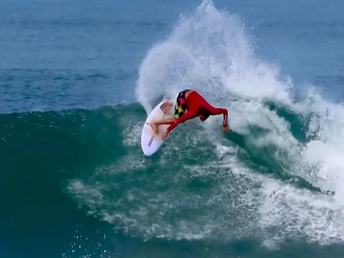Costa Rican surf champion and coach Álvaro Solano carving a powerful Playa Hermosa wave